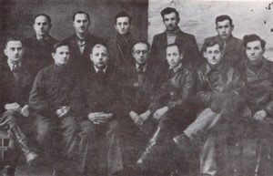 Survivors of the Treblinka II Extermination Camp (public domain), Schmulke (Sam) Goldberg is in the center in the top row